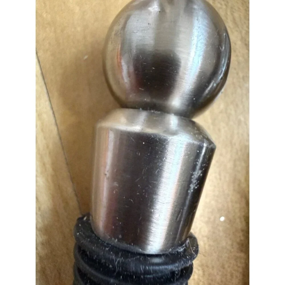Two piece metal wine stoppers